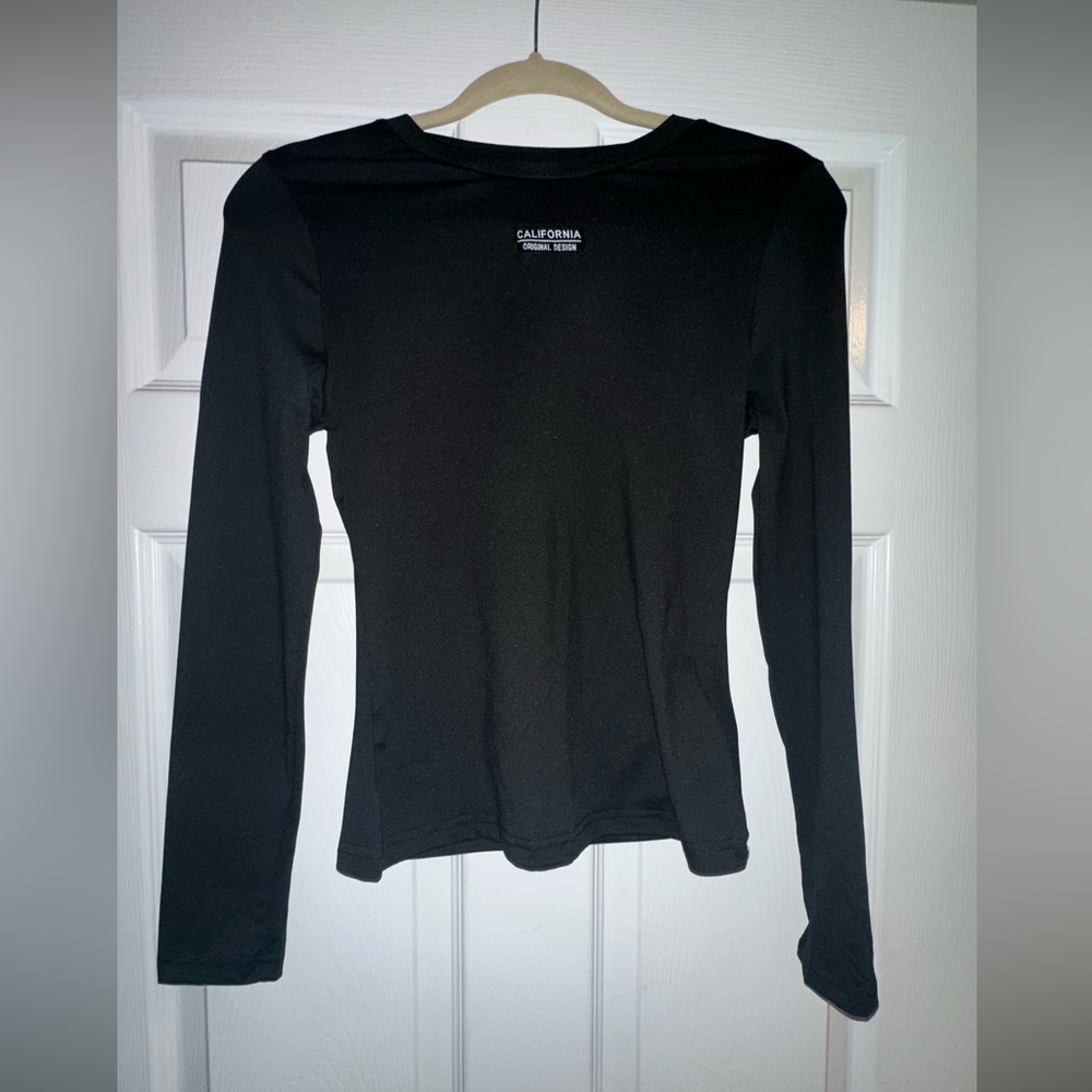 3 piece long sleeve women’s set of black, brown, and what all in size small.